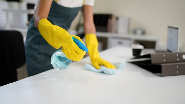 Professional cleaner with yellow gloves